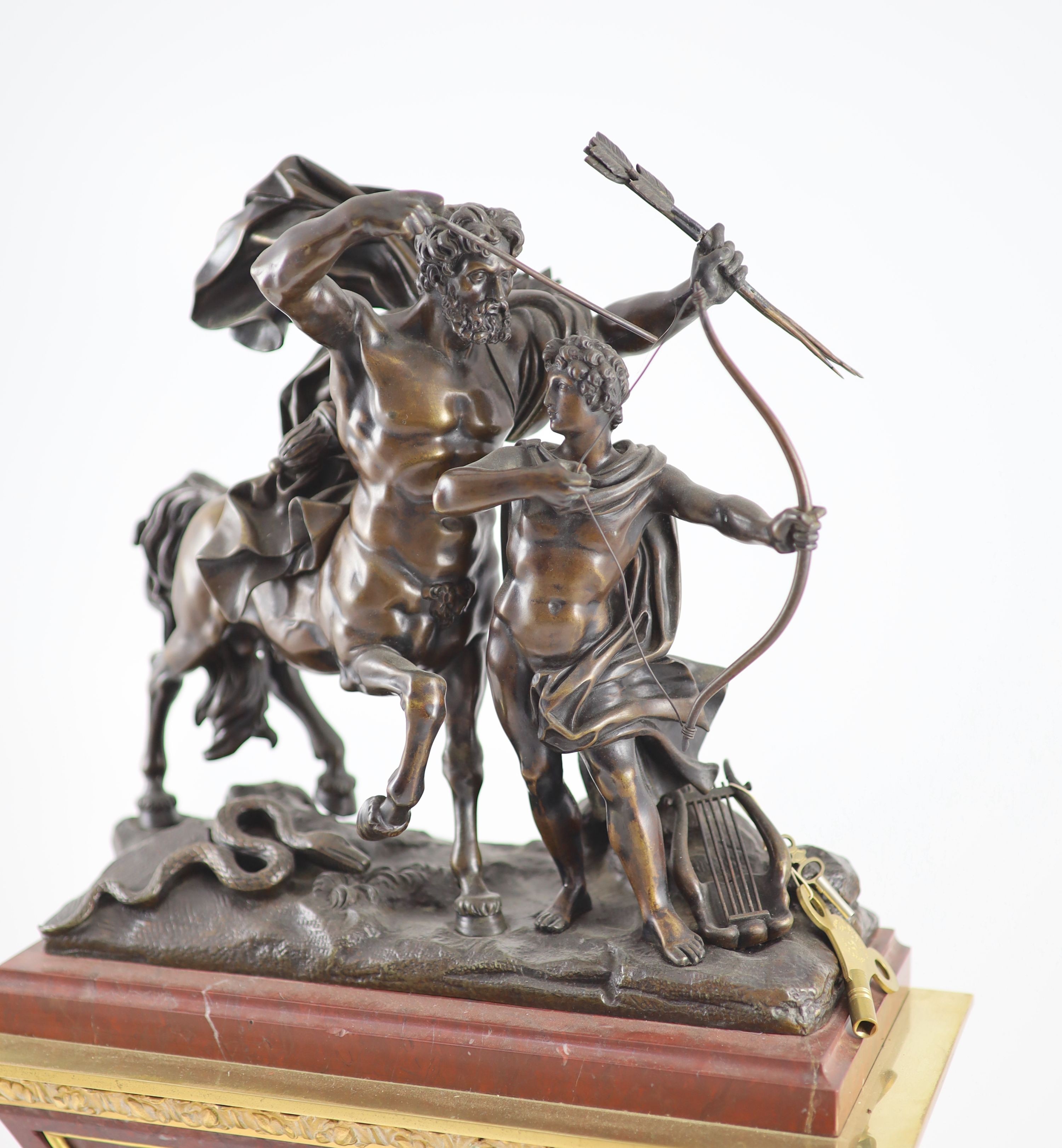 A late 19th century French bronze mounted rouge marble mantel clock, H 53cm. W 34cm.